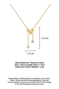 Detail view of gold butterfly tassel necklace in titanium steel with shell inlay