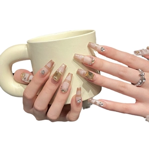 Faux ongles dégradés œil de chat forme cercueil avec pierres précieuses champagne et perles