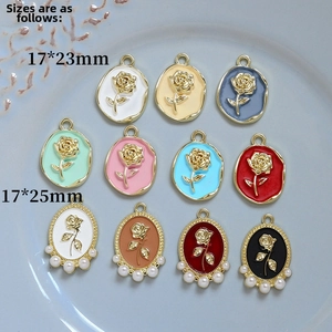 Detail of enamel rose pendants in various colors with pearls for DIY jewelry making