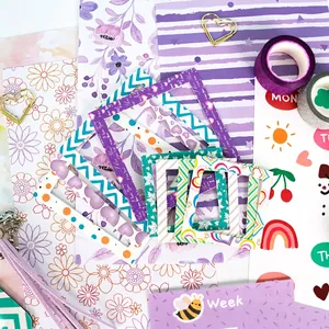 Purple DIY journal stationery set with decorative paper frames and washi tape