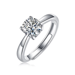 Macro view of a classic round moissanite ring with six-prong setting and silver finish