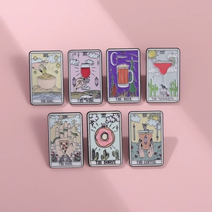 Set of seven creative tarot-style enamel pins featuring food and drink theme designs
