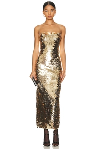 Full body view of a shimmering gold sequin floor-length evening dress with thin straps