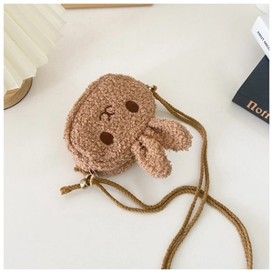 Detail of cute brown teddy fleece rabbit crossbody bag with soft texture and 3D ears
