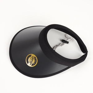 Detail of black UPF50+ sun hat with adjustable strap and wide brim for UV protection