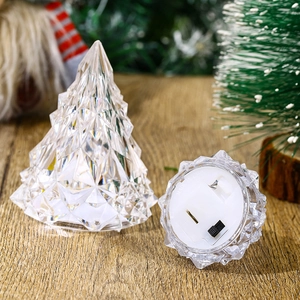Detail of crystal LED Christmas tree lamp showing the diamond-cut texture and base switch