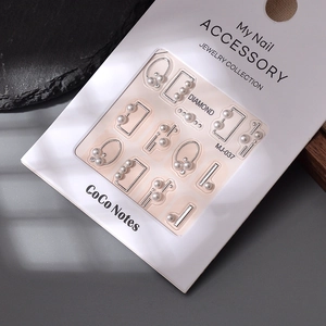 Detail of MJ-037 5D pearl nail art decals with silver geometric metal frames and pearls