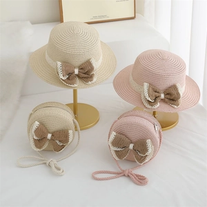 Ensemble chapeau de paille et sac bandoulière rond pour fille avec un élégant nœud brun