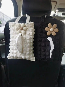 Car headrest tissue holder with floral decor in pleated fabric, black and white style