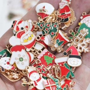 DIY Christmas enamel charms featuring Santa, reindeer and trees for bracelet making