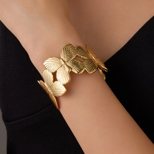 Fashionable gold butterfly open bracelet with detailed filigree patterns for women