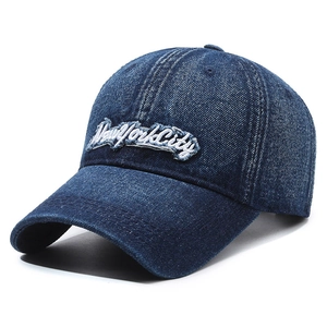 Vintage dark blue denim baseball cap with New York City embroidery and distressed details