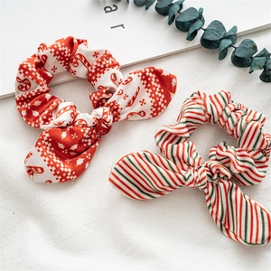 Christmas plush bow scrunchies set with festive candy cane and snowflake patterns