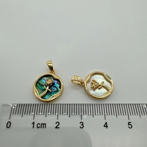 Detail of 18K gold-plated rose flower pendants in white and blue shell with measurement