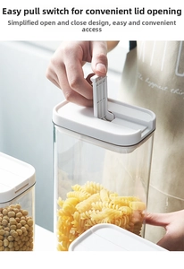 Close-up of airtight food container with easy-lock lid storing pasta in a kitchen setting
