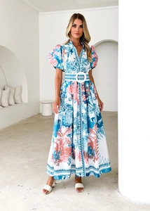 Detailed view of puff short sleeves and printed wide belt on a summer maxi dress