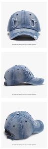 Detailed views of light blue washed denim baseball cap with distressed rip texture
