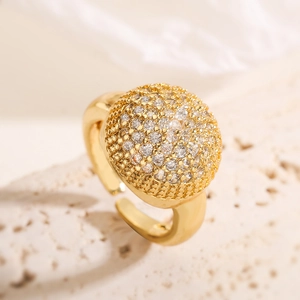 Gold plated open ring with pavé heart geometric zircon stones on stone background