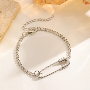 Detailed view of silver paperclip pendant on minimalist chain necklace for women