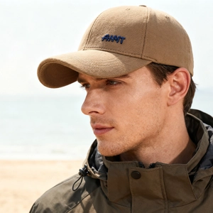 Brown fleece baseball cap with ANMT embroidery and warm lining for outdoor leisure