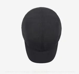 Top view of black quick-dry five-panel baseball cap showing stitching and fabric texture