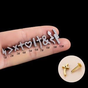 F136 titanium earrings set featuring zircon heart, cross, and snake designs in silver