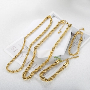 Detail shot of 18K gold plated twisted rope chain necklaces and bracelets set