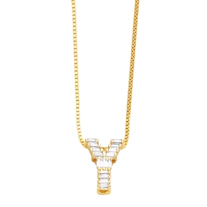 Macro shot of gold Y-shaped pendant necklace featuring square-cut zircon stones