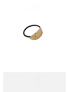 Detail view of 5cm diameter black hair tie with hammered gold oval alloy ornament