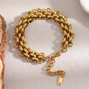 Three-layer interlocking gold-plated stainless steel chain bracelet with lobster clasp