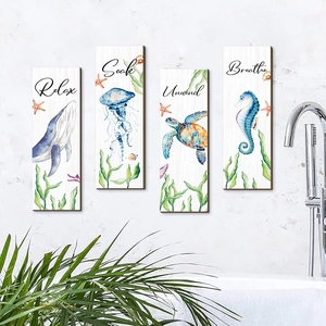 Set of 4 nautical ocean wall art featuring whale, turtle and seahorse for bathroom decor