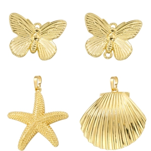 Detailed set of gold-plated butterfly, starfish and seashell charms for jewelry DIY