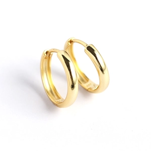 Classic pair of glossy 925 sterling silver golden hoop earrings for women with minimalist style