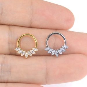 F136 titanium clicker hoop with marquise zircon in gold and silver finish