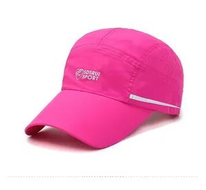 Detail view of the breathable mesh structure and reflective strip on the rose red sport cap
