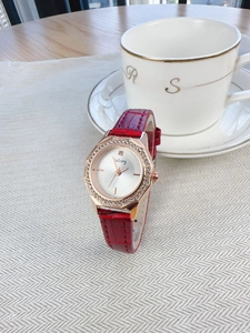 Octagonal rose gold watch with red crocodile leather strap and diamond-encrusted bezel