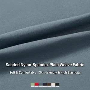 Tight long sleeve yoga top in grey-blue brushed fabric with high elastic and soft texture