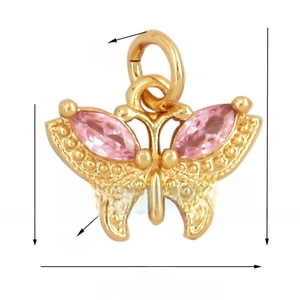 Macro shot of 14x14mm gold butterfly jewelry pendant with pink marquise zircon stones