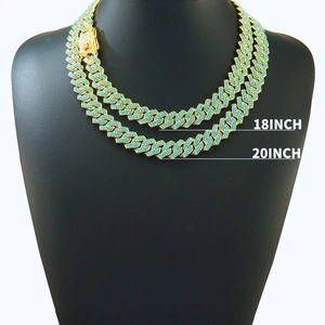 Two iced-out gold Cuban link necklaces with turquoise stones in 18 and 20 inch lengths