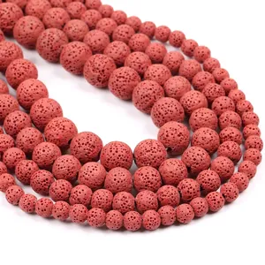 Macro view of reddish-brown lava stone beads with natural porous honeycomb texture