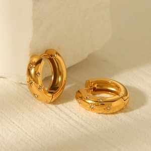 18K gold plated stainless steel huggie earrings with frosted starburst and diamond accents