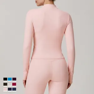 Back view of a slim-fit pink zip-up long sleeve yoga jacket and leggings sports set