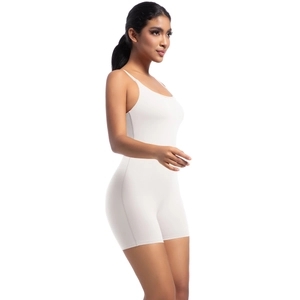 Side view of white thin strap yoga bodysuit with U-neck and bodycon fit for sports