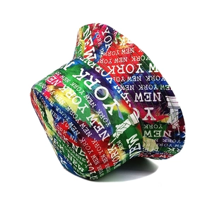 Detail of colorful tie-dye bucket hat with New York text and Statue of Liberty print