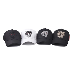 Set of cotton baseball caps with tiger head embroidery in black and white colors