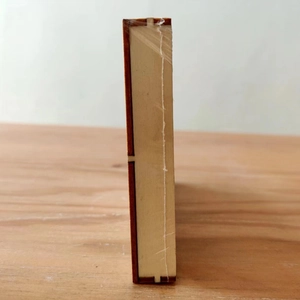 Detail shot of the multi-layer wood texture and side structure of Christmas ornament