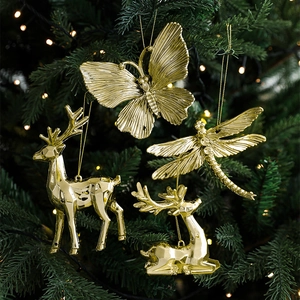 Golden Christmas tree ornaments set featuring butterfly dragonfly and reindeer pendants