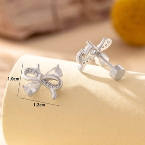 Elegant silver bow earrings with clear zircons and screw back, size 1.0cm x 1.2cm