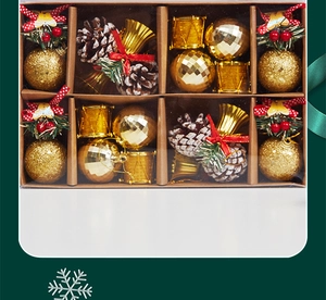 Close-up of Christmas ornaments set with pine cones, golden balls and bells in a gift box