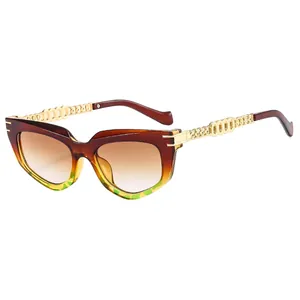 Retro cat eye sunglasses with tortoise gradient frames and gold metal chain temples